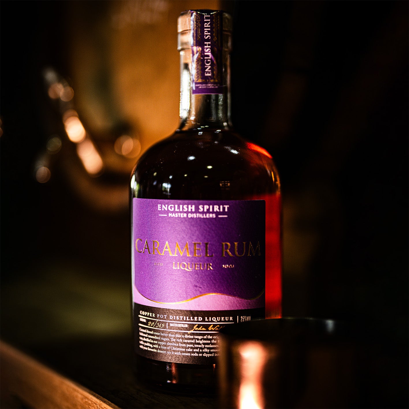 Handcrafted Smooth Caramel Rum Liqueur with golden tones and indulgent flavour, perfect for sipping or gifting.