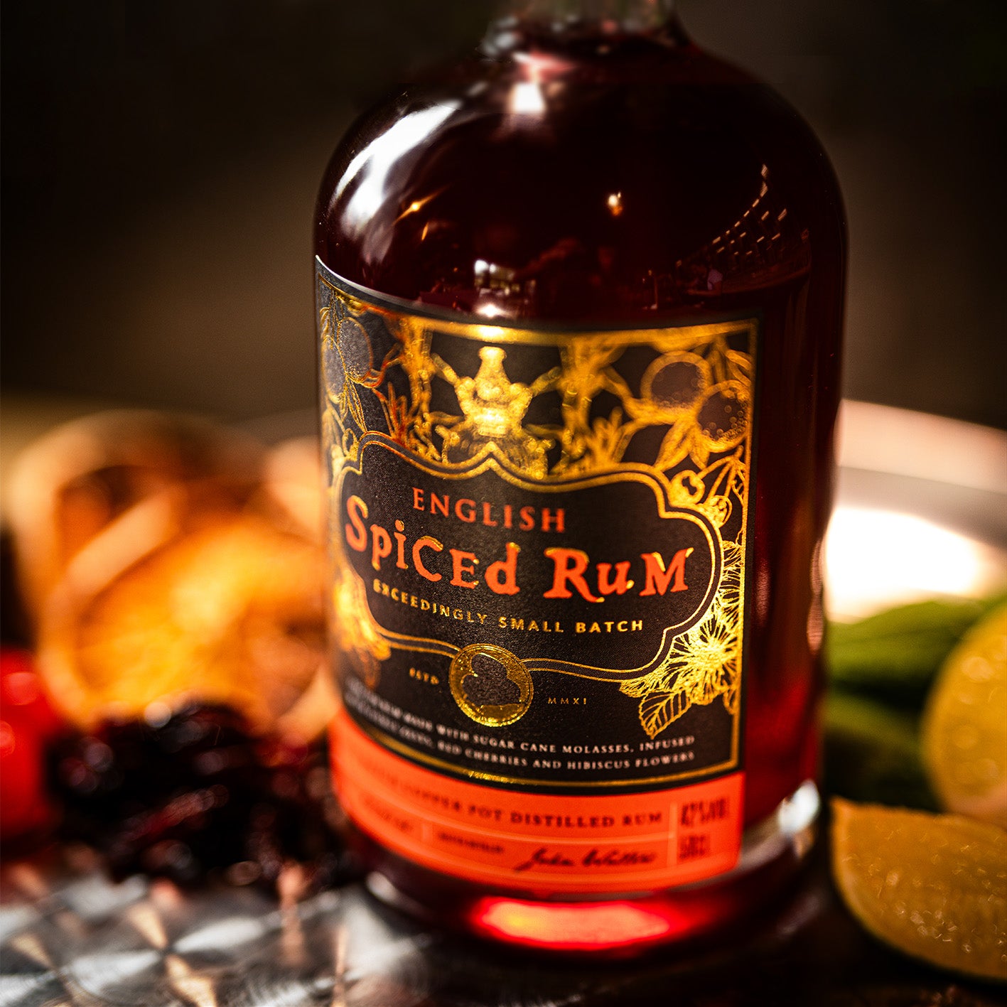 Discover English Spiced Rum - 42% ABV, made from UK-distilled Old Salt Rum, infused with cherries, hibiscus, citrus, ginger & vanilla for a sooth, fruit-forward kick. Perfect sipped neat, pair with Coke or mix in cocktails. Shop now for fast UK delivery.