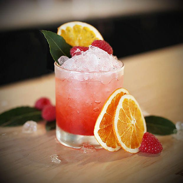 Fruity & Vibrant non-alcohlic Raspberry & Bay Shrub - hand-crafted in the UK with distilled orange spirit vinegar, fresh raspberries, fragrant bay leaves. Perfect with tonic, sparkling water or bubbles for a vibrant, flavour-packed mixer.