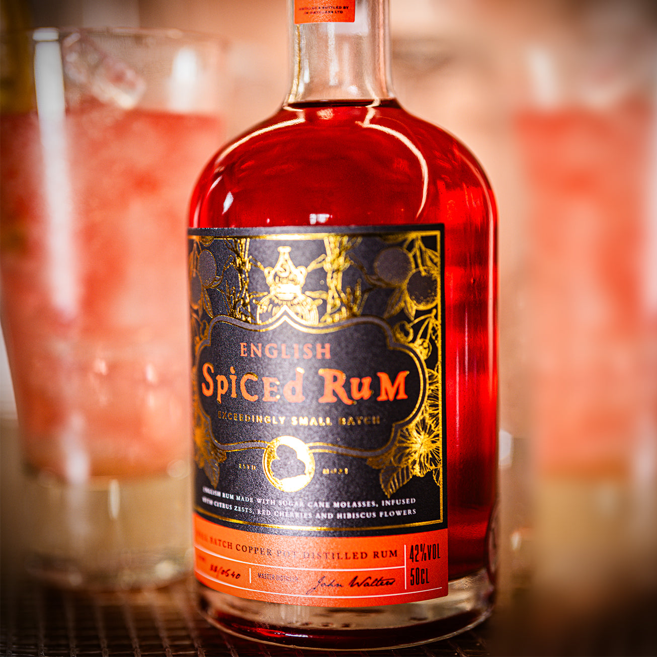 Discover English Spiced Rum - 42% ABV, made from UK-distilled Old Salt Rum, infused with cherries, hibiscus, citrus, ginger & vanilla for a sooth, fruit-forward kick. Perfect sipped neat, pair with Coke or mix in cocktails. Shop now for fast UK delivery.