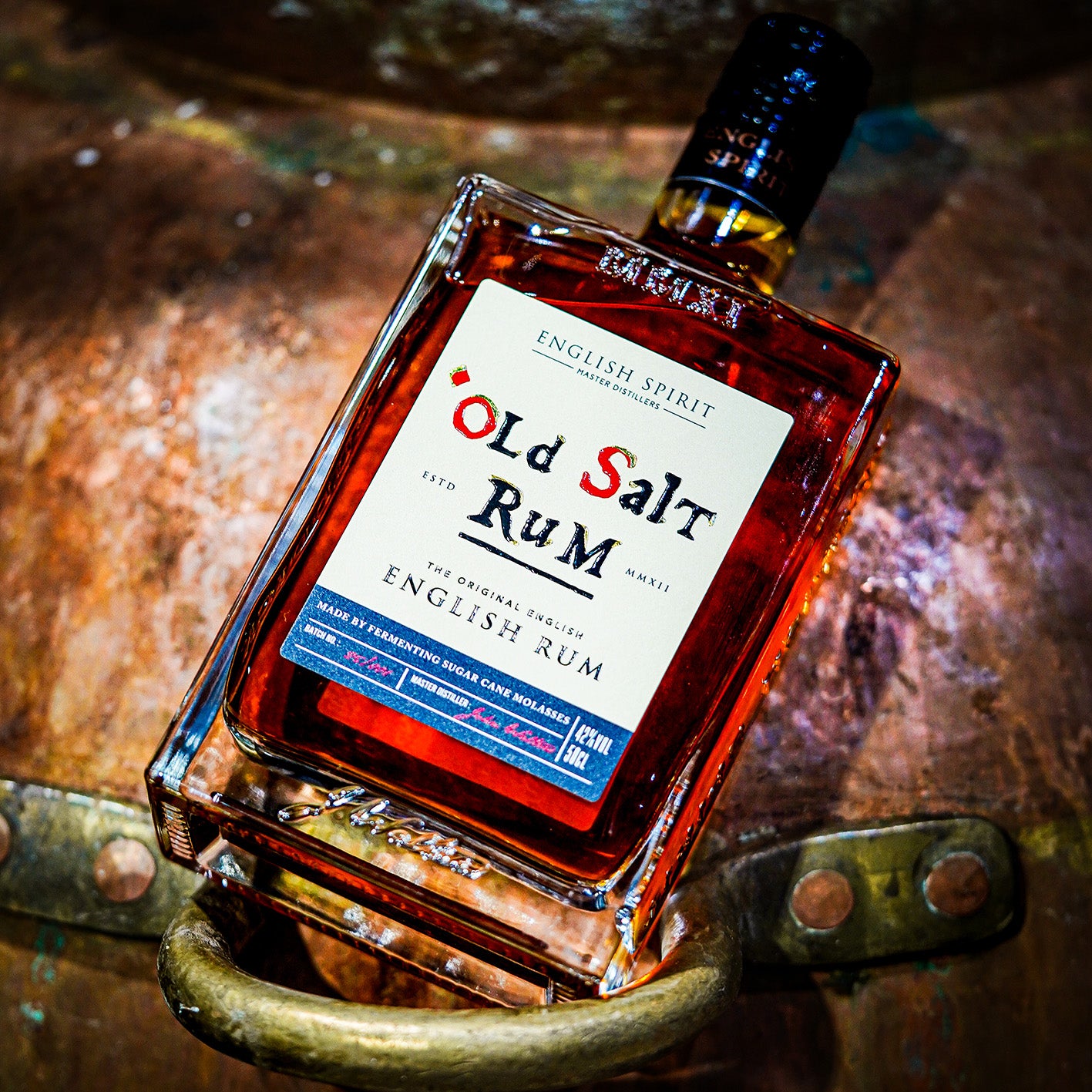Old Salt Rum – British rum by English Spirit, 50cl bottle displayed on top of barrel