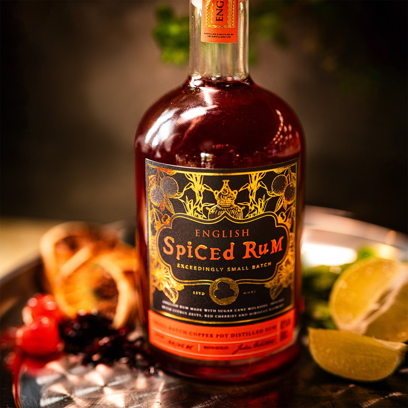 Discover English Spiced Rum - 42% ABV, made from UK-distilled Old Salt Rum, infused with cherries, hibiscus, citrus, ginger & vanilla for a sooth, fruit-forward kick. Perfect sipped neat, pair with Coke or mix in cocktails. Shop now for fast UK delivery.
