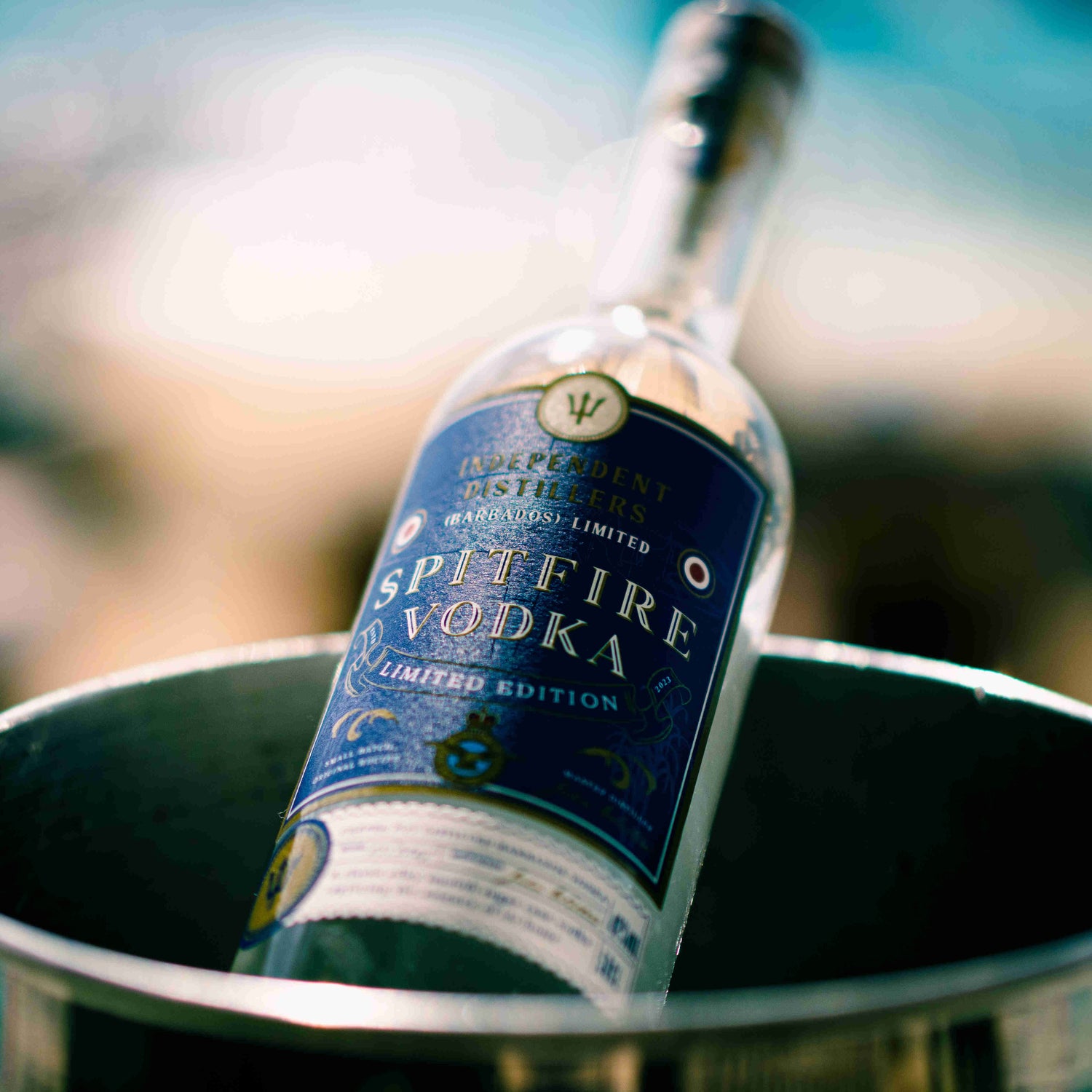 Barbados Spitfire Vodka. 50cl bottle. Nestled in ice beside a tropical backdrop. A silky smooth vodka single distilled  from Barbados Sugar cane.