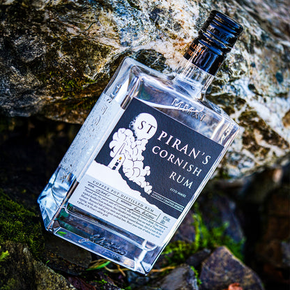 Discover St Piran's Cornish Rum: handcrafted, triple-distilled white rum infused with rich notes of raisin, caramel & coconut 
