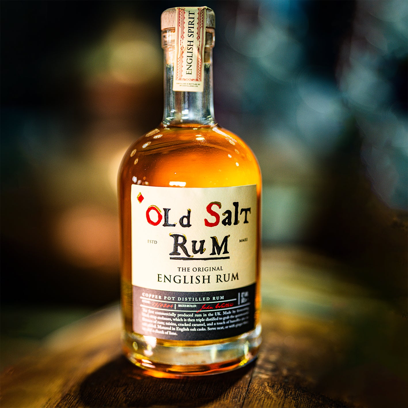 Old Salt Rum – British rum by English Spirit, 50cl bottle displayed on top of barrel