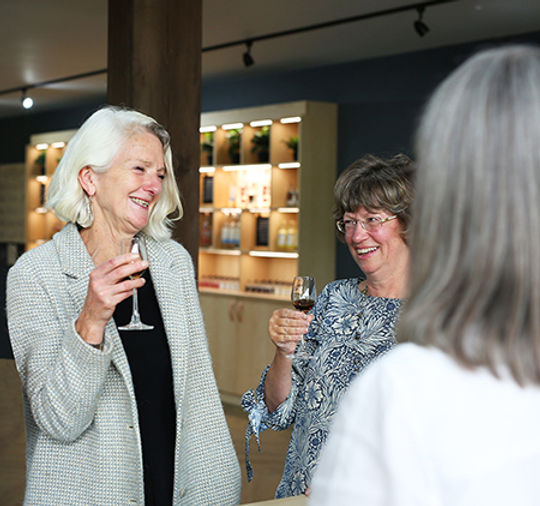 Customers enjoying a tour and tasting at Treguddick Distillery